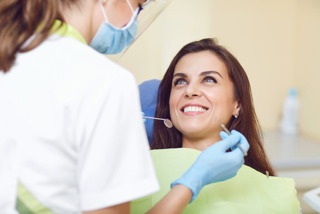 A woman and a dentist in a dental clinic.