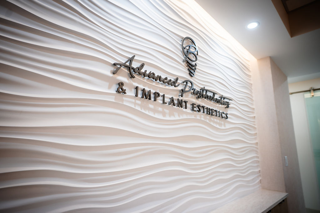 APIE logo on the wall